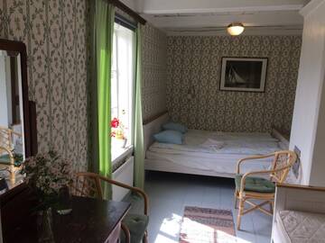 Фото номера Трехместный номер с общей ванной комнатой Гостевой дом Guesthouse Enigheten г. Фёглё 3